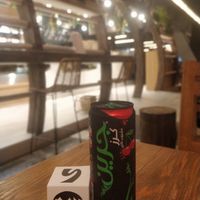 My poverty snack (single praline and indie sugarfree cherry cola) at DOH - Evergreen Organics in Doha