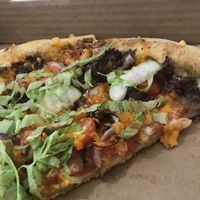 Cheeseburger pizza   at Down 2 Earth Plant Based Cuisine in Las Vegas