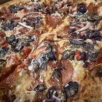 Pizza close up  at Down 2 Earth Plant Based Cuisine in Las Vegas