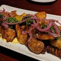 Smashed garlic potatoes at Sprig and Vine in New Hope
