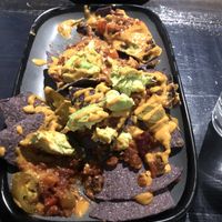 Nachos with added avocado   at Col's Kitchen in Concord