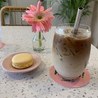 Iced latte and passion fruit macaron  at Nature's Charm in Bangkok
