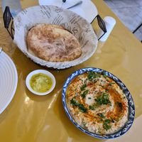 Fresh pitas with hummus and spicy sauce at Haba-Eat in Batumi