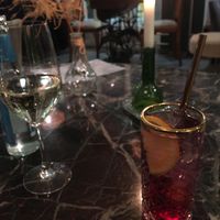 Hausgemachter Hibiskus-Eistee und ein Glas Wein    at Villa Kalka in Cologne