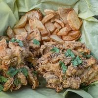 Fried “chicken” was just two large deep fried mushrooms. Very hard and crunchy. Once again, I didn’t get any sauce    at Belenty's Love in Fort Worth