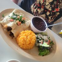 Queso covered enchiladas at Belenty's Love in Fort Worth