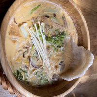 Soup with coconut base  at Com Chay in Mannheim