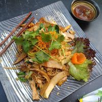 Fried noodles with mushrooms, tofu and greens at Com Chay in Mannheim