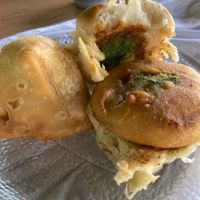 Samosa and Mashed Potato Ball Sandwich  at Sunny's Asian Food & Spices in Solon