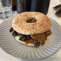 Harissa, spinach & mushroom bagel  at Sunday Cantina in Raumati