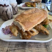 Vegan fish finger sub with homemade slaw, lettuce and tartare sauce. Fish fingers were made using banana blossom.  at The Lighthouse   in Milford On Sea