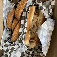 everett brat with onion rings  at The Bayside Cafe in Everett