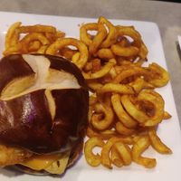 Breakfast sandwich with curly fries at The Bayside Cafe in Everett