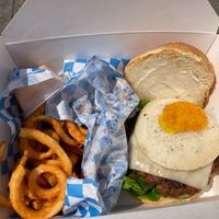 Yo Egg burger with curly fries at The Bayside Cafe in Everett