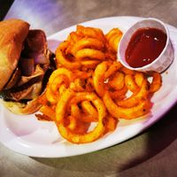 Bacun burger with blue chee and curly fries at The Bayside Cafe in Everett