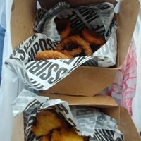 Fried pickles with great, almost corn dog style batter and onion rings at The Bayside Cafe in Everett