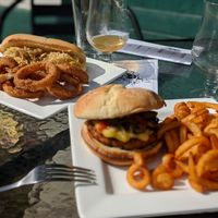 Scorpion Burger with curly fries; German Brat with onion rings at The Bayside Cafe in Everett