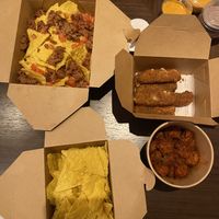 Nachos, cheese sticks, chips, wings  at Nosh Cravings in Doha