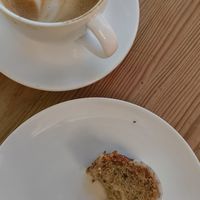 Lemon cake and coffee with oat milk at Smørtorget in Tromsoe