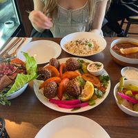 Falafel with hummus, fattoush, moussaka with rice, and some pickled veggies  at Little Petra in Cambridge