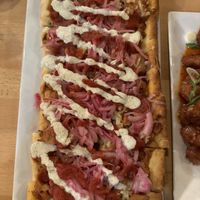 Barbecue jackfruit pizza with pickled onions and vegan ranch drizzle    at Seva - Ann Arbor in Ann Arbor