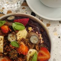 Acai bowl and oat latte at Szimply in Budapest