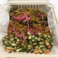 Coconut Curry Bowl to go. Loved it. Served in a compostable container. at Bombay Pizza Kitchen in Plymouth