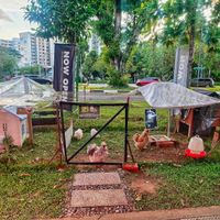 In front of their shop at OsomeFood in Northeast Singapore
