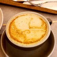 Turmeric latte with almond milk at Cedele - Raffles City in Central Singapore