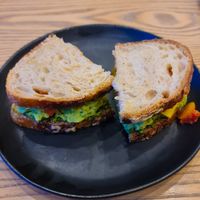 Grilled plant based cheese sandwich with Pesto on Sourdough at Plantiful - Plant-based Cafe in Bangkok