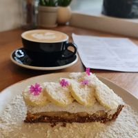 Banoffe pie with a flat white with oat milk. at Plantiful - Plant-based Cafe in Bangkok