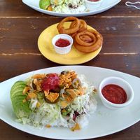 Avocado taco rice with jalapenos. 
Also onion rings  at Taco Rice Cafe Kijimuna in Onna