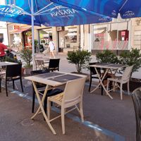 Outdoor seating at Emilios in Geneva