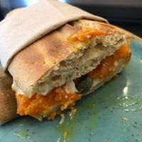 Spelt bread with smoked carrot, fermented horseradish cream cheese and capers at Hasard in Biel