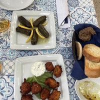 Stuffed wine leaves (top) and fried chickpea balls (bottom)    at Klimatis Tavern in Kefalonia