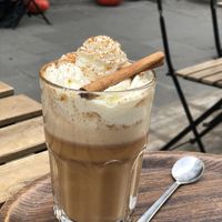 Pumpkin spice latte with wipped cream  at Lucifer Lives in Brussels