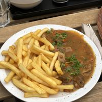 Carbonade with fries  at Lucifer Lives in Brussels