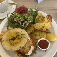 Croque monsieur (grilled cheese) with side salad and egg on top, 100% vegan  at Lucifer Lives in Brussels
