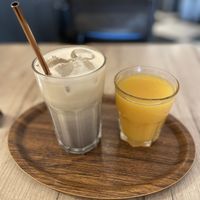 Iced lavender latte and orange juice  at Lucifer Lives in Brussels