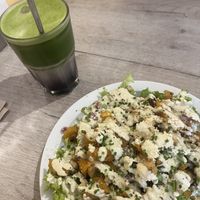 Caesar salad and ice lavender matcha  at Lucifer Lives in Brussels