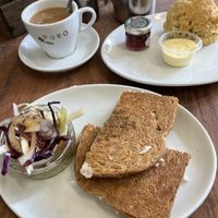 Mozzarella & pesto toastie, tea with oat milk & cream tea  at The Greenwood Tree in Lyndhurst