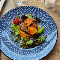 aubergine steak met zoete aardappel crème, chimichurri en gegrilde bimi at Bree33 in Leiden