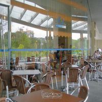 Exterior Seating Area with a Green View ... at Raj Restaurant - Biopolis in Central Singapore