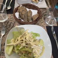 Ceasar‘s salad, bread a nd a caspaccio  at Tulsi in Barcelona