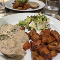 Vegan steak, mushroom sauce and fried potatoes  at Tulsi in Barcelona