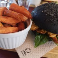 Heura burger wirh spinach, vegan cheese and fried sweet potato. at Green&Burger in Terrassa