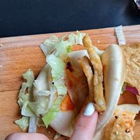 Steamed dumplings are awesome but tofu buns are bland with the smallest amount of sauce. The whole place is not very clean. at Tloft in Ljubljana