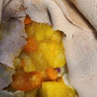 Potato carrot stew on injera at Lalibela in Sioux Falls