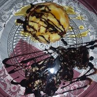 Complimentary vegan desert platter as they remembered us from coming before so go to this restaurant more than once you might get this. It was the mosaic + lemon tart which was yum at Jasmine Restaurant in Planos