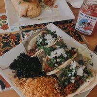 Tacos and chimichanga with soy chorizo. Subbed black beans for refried, as refried are not vegan   at El Azteca Mexican Deli in Poughkeepsie